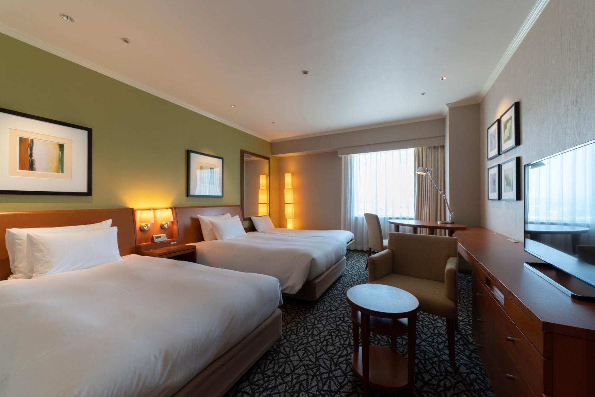 Hotel Associa Тоёхаси Экстерьер фото A room at the hotel