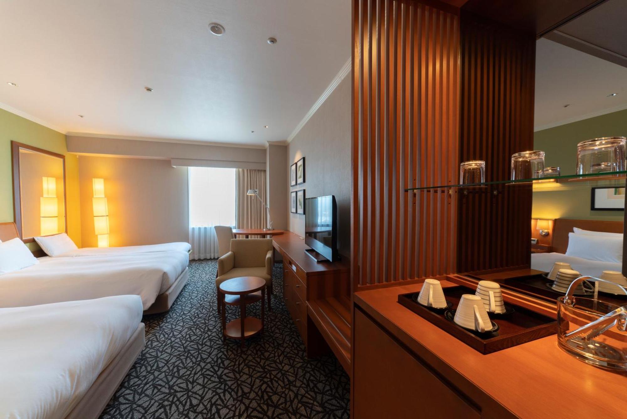 Hotel Associa Тоёхаси Экстерьер фото A room at the hotel